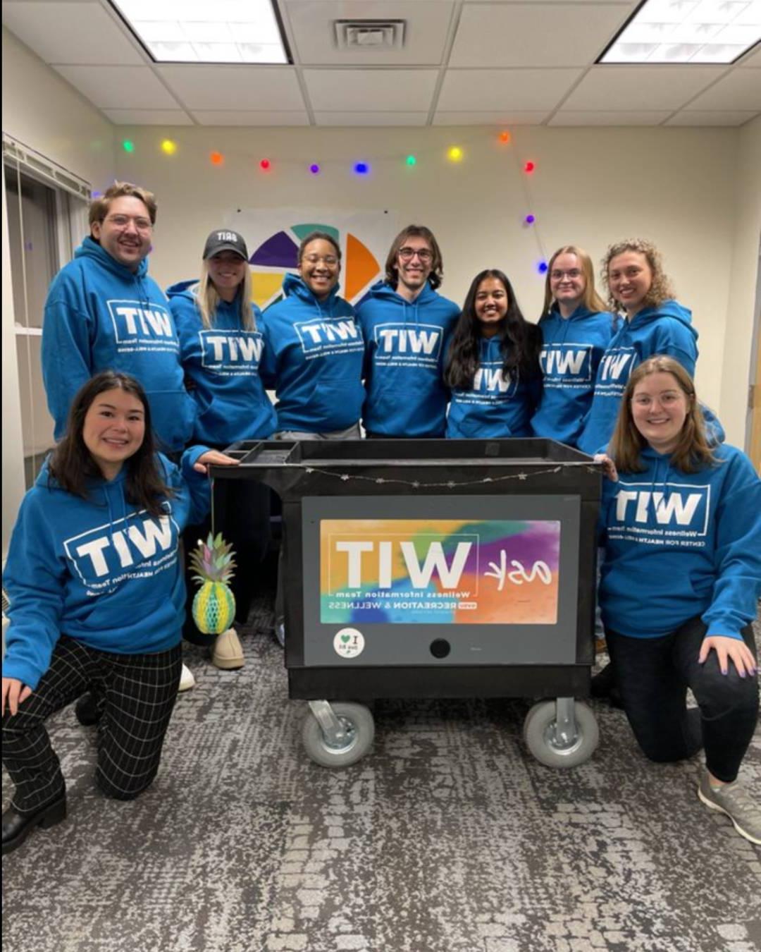 Picture of GVSU students in front of the WIT cart.